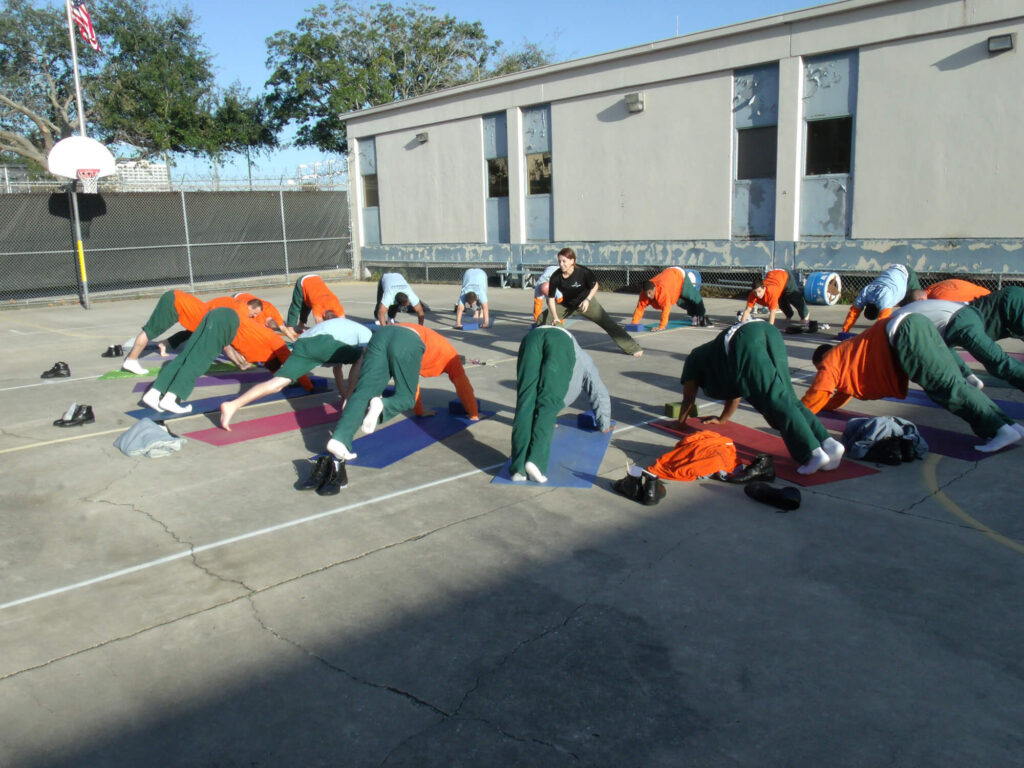 People doing yoga outside